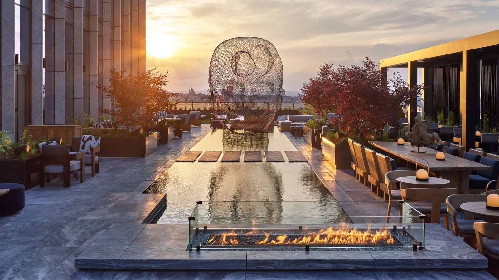 Rooftop reflecting pool and flame trough on the amenity terrace