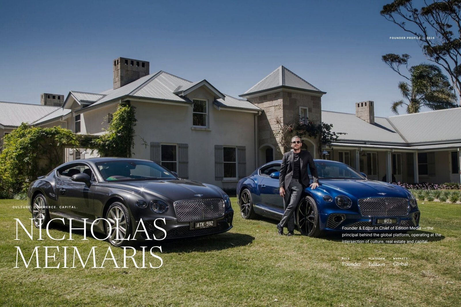 Cover of Edition Media's Founder Profile: Nicholas Meimaris, Founder and Editor-in-Chief, in a dark suit and sunglasses leans against a silver Bentley on the lawn of a grand white estate mansion, a blue Bentley beside him under a clear blue sky.